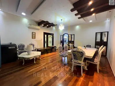 Villa in Al Rawda 1 area, corner plot on two streets, opposite a mosque. Modern design, close to all services, high-end finishing, price includes elec
