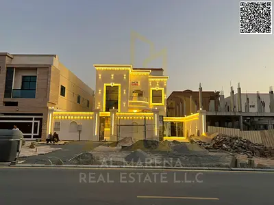 Luxury villa for sale in Al Muwaihat 1 | 5000 sq ft | Two floors + roof | 5 master bedrooms | Majlis, living room + maid's room | Large yard and exter