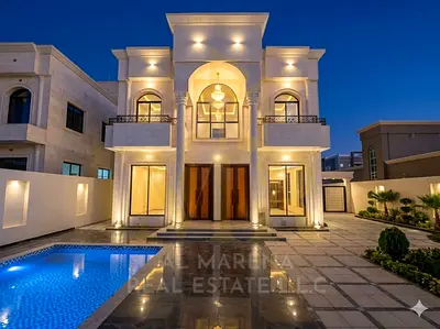 Enjoy luxury with a pool | Own a luxurious villa in Al Rawda, Ajman | 5 master bedrooms, 2 floors, and a rooftop | Prime location on Sheikh Ammar Stre