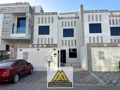 تاون هاوس أربع غرف أرضي وأول وروف للبيع في الزاهية عجمان شامل الكهرباء والمياه والمكيفات