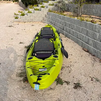 Two-seat sit-on-top kayak with paddles - good condition