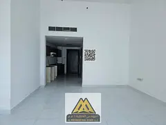 A larger-than-usual studio with full parking and a relaxing view inside Falcon Towers