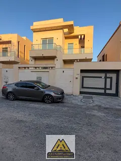 5 master bedrooms Majlis (formal sitting room) 3 living rooms Maid's room Preparation kitchen 2 balc