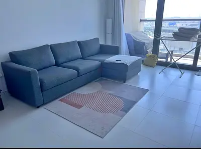 Grey L-shaped Sofa bed with — Good Condition