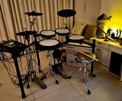Roland V-Drums TD-12 Electronic Drums with Roland package throne pedal and sticks  .