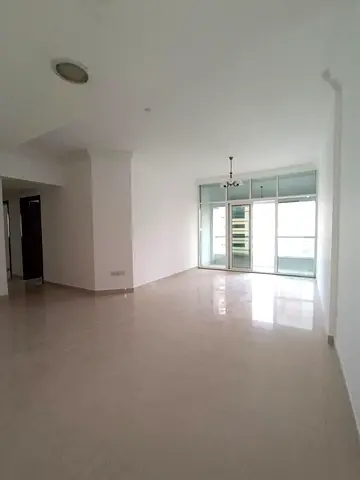 2 master bedrooms with open-view balcony, 3 bathrooms, gym, pool, kids area, parking and central AC in Al Taawun. Prime family location.