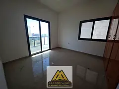 A spacious one-bedroom apartment with a balcony and a view in the Al-Jarf 2 area, close to Al-Aqsa S
