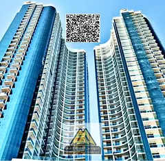 Two-bedroom apartment for rent in Al Waha Towers - Al Rashidiya 1, Ajman | 3 balconies | Private par