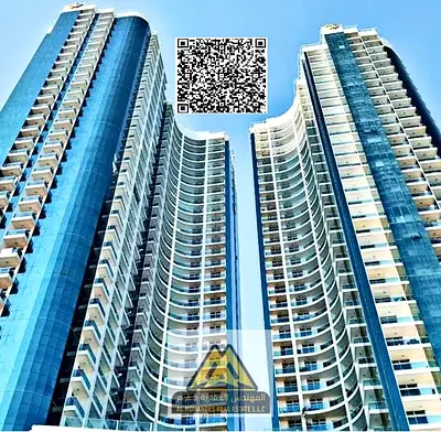 شقة غرفتين وصالة للإيجار في أبراج الواحة – الراشدية 1 عجمان | 3 بلكونات | باركن خاص | جيم ومسبح | 48 ألف