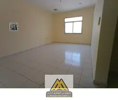 Annual rent in Al Rashidiya Ajman, 2BR apartment with separate hall, large space, 2 bathrooms, near 