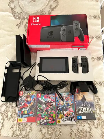 Nintendo Switch console with dock, Joy-Cons, 5 games and accessories - good condition