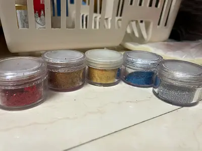 Assorted cake sprinkles and edible decorations - lot of bottles and jars