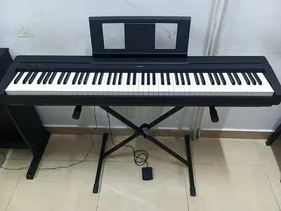 The Yamaha P-45B (Black) is a compact, 88-key entry-level digital piano. It features weighted Graded
