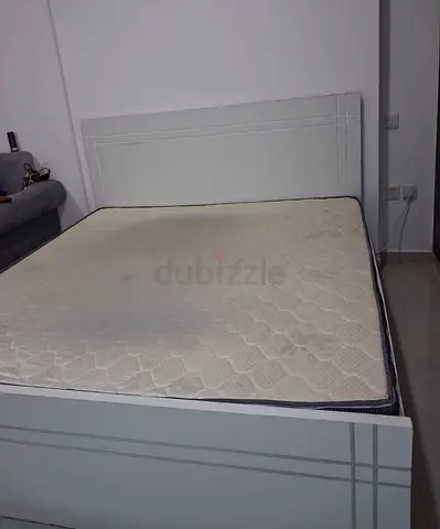 White wooden double bed frame with mattress - good condition