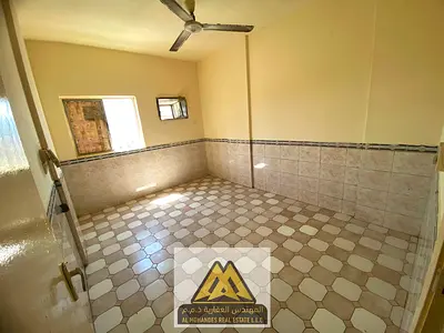 One bedroom and living room No air conditioning Very clean building Second row from Ajman Corniche