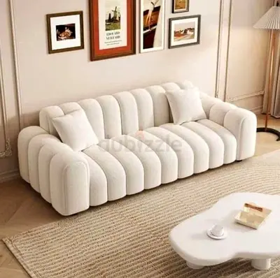 Modern off-white channel tufted 3-seater sofa — good condition