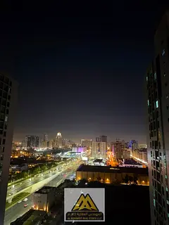 One bedroom and living room with a balcony offering an open view in City Tower Al Nuaimiya 3, near a