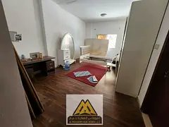 Annual studio for rent in Al Jurf 2. Spacious ground-floor unit with a semi-separate kitchen. AED 19