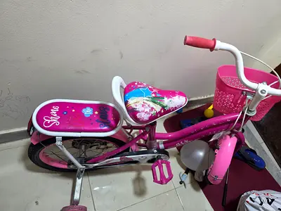 Pink Girls Bicycle with Training Wheels and Front Basket