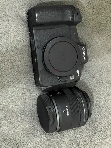 Canon EOS R mirrorless body with Canon 35mm lens - cage snd battery grip