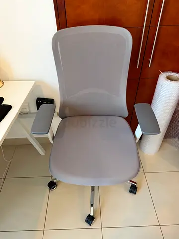 Desk with ergonomic mesh office chair with adjustable arms and wheels + standing desk with foot mat