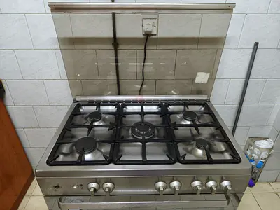 Stainless Steel 5-Burner Gas Stove with Oven - Good Working Condition