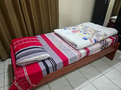 Single wooden bed frame with mattress included - good condition
