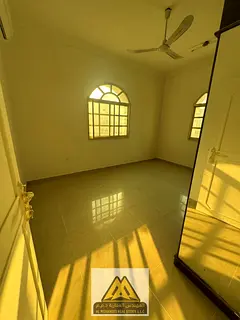 5-bedroom villa for annual rent in Al Mowaihat 2, Ajman. Features a majlis, spacious living room, 5,