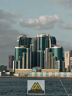 Enjoy luxury living in Orient Towers, Al Bustan, Ajman. This beautifully furnished 2-bedroom apartme