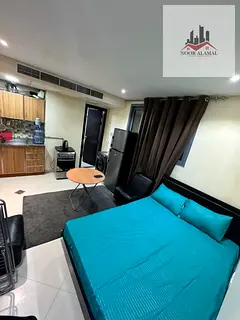 Studio apartment in Al Qulayaah, Sharjah, featuring hotel-style furnishings.