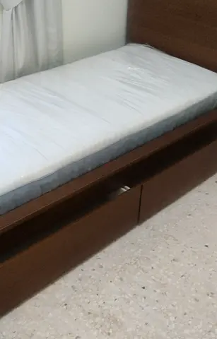 IKEA Malam single bed (90x200) with two handy storage drawers and a flawless mattress