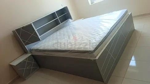 Gray double bed frame with headboard storage and mattress - good quality