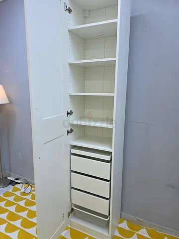 Ikea white tall cabinet with drawers and shelving - good condition