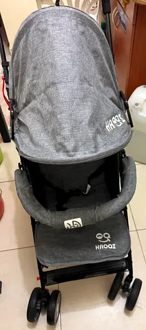 Lightweight grey Hqoq baby stroller — compact and foldable