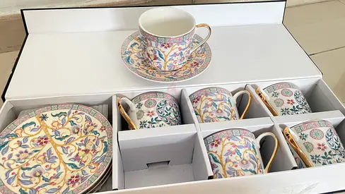 12 twelve cups and 12 twelve fruit plates