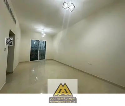 Annual rent: 1BR apartment in Al Yasmeen, Ajman. New building, balcony, 2 bathrooms, central AC, elevator, AED 34,999.