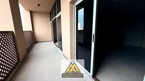 The most beautiful and largest 3-bedroom apartment with a living room on Ajman Corniche, featuring a
