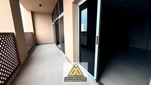 The most beautiful and largest 3-bedroom apartment with a living room on Ajman Corniche, featuring a balcony with an open view and free gas.