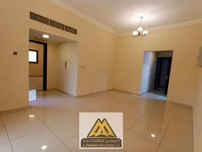 One-bedroom apartment with hall in Al Hamidiya 1, second tenant, nice balcony, central AC, free maintenance, AED 32,000 in 4 payments, very good locat