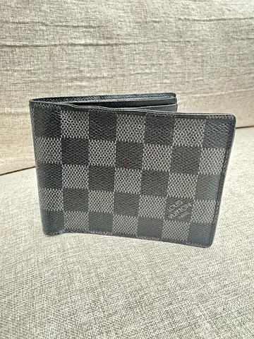 Louis Vuitton mens bi-fold wallet - black