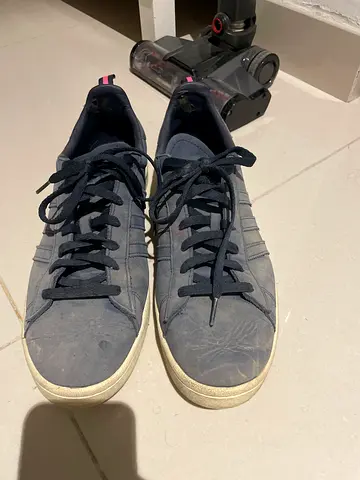 Used mens casual navy sneakers - size not specified