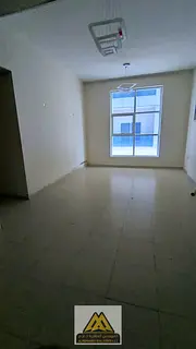 Two-bedroom apartment for annual rent in City Tower, Al Nuaimiya 3, Ajman. Features central AC, free