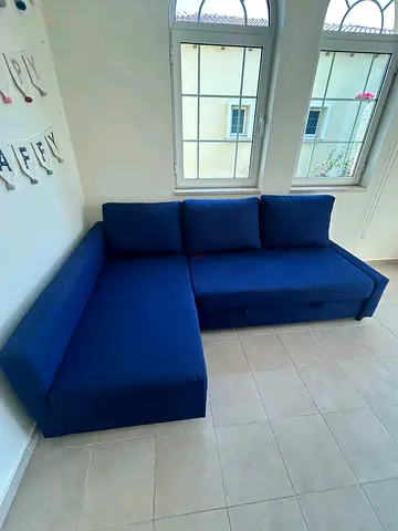 Blue L-shaped Fabric Sofa bed - Good Condition