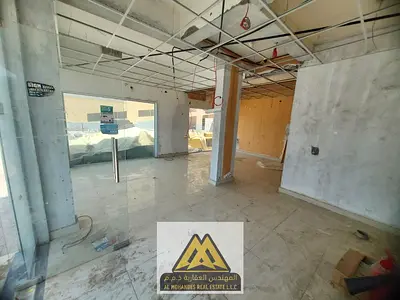 Two adjacent shops that can be combined in Al Nuaimiya 1, a vibrant area suitable for any commercial activity.