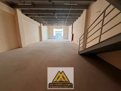 Spacious commercial space with a mezzanine for rent in Al Jurf Industrial Area 2, Ajman – strategic location and practical area