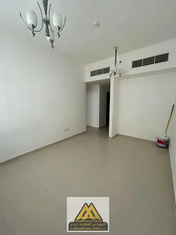 1 Bedroom Apartment for Rent in Emirates City – Al Ameera Village | AED 30,00-1 Bedroom Spacious Living Hall Practical Layout Comfortable Living Spac0