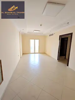 One-bedroom apartment for rent in Al Taawun | Balcony + 2 bathrooms + Free parking