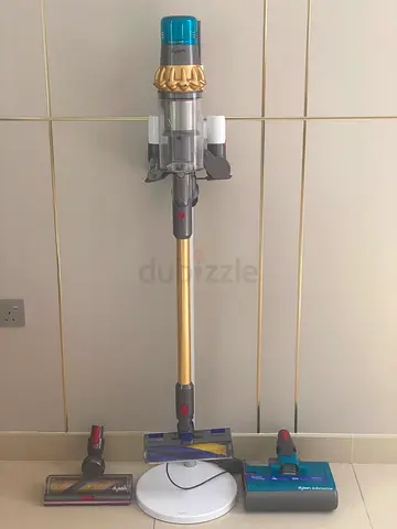 Dyson submarine cordless stick vacuum with mop head and stand and extra heads — good condition