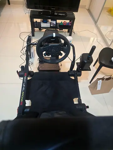 Next Level Racing wheel stand with Logitech racing wheel and pedal set
