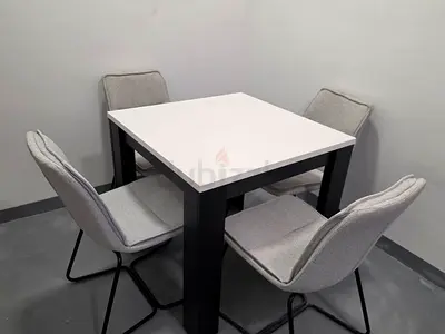 Square White and Black Dining Set with Four Grey Chairs